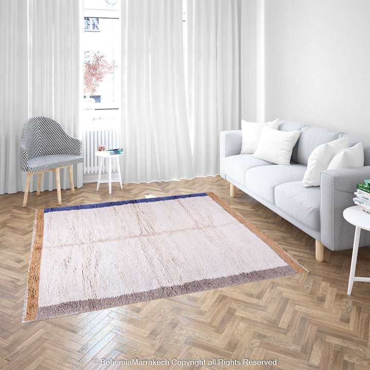 Cream Beni Ourain Moroccan rug with blue and beige borders – handmade wool