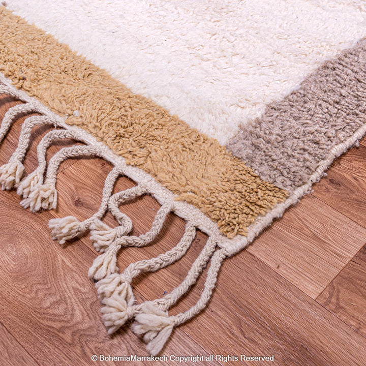 Cream Beni Ourain Moroccan rug with blue and beige borders – handmade wool