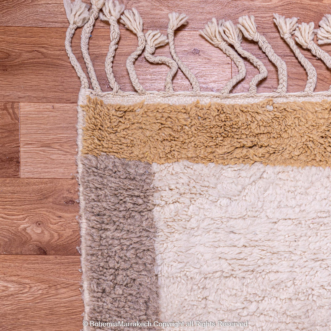 Cream Beni Ourain Moroccan rug with blue and beige borders – handmade wool