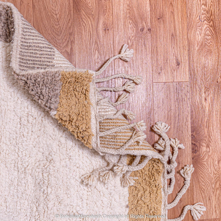 Cream Beni Ourain Moroccan rug with blue and beige borders – handmade wool