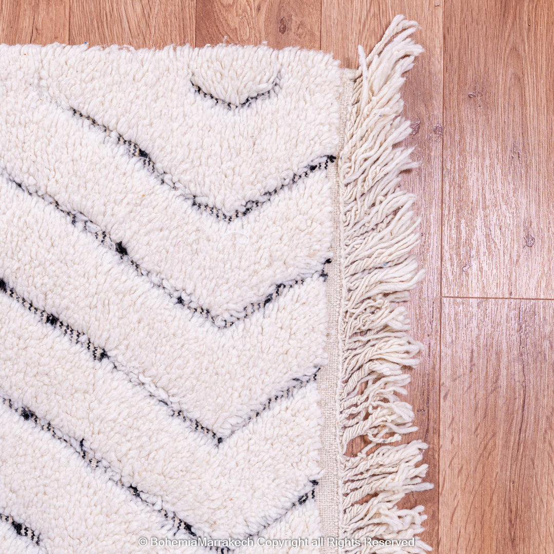 White Moroccan wool shag rug with black diamond lines
