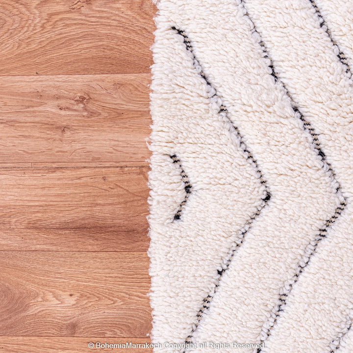 White Moroccan wool shag rug with black diamond lines