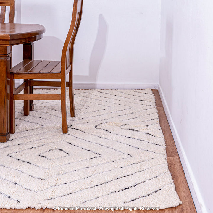 White Moroccan wool shag rug with black diamond lines