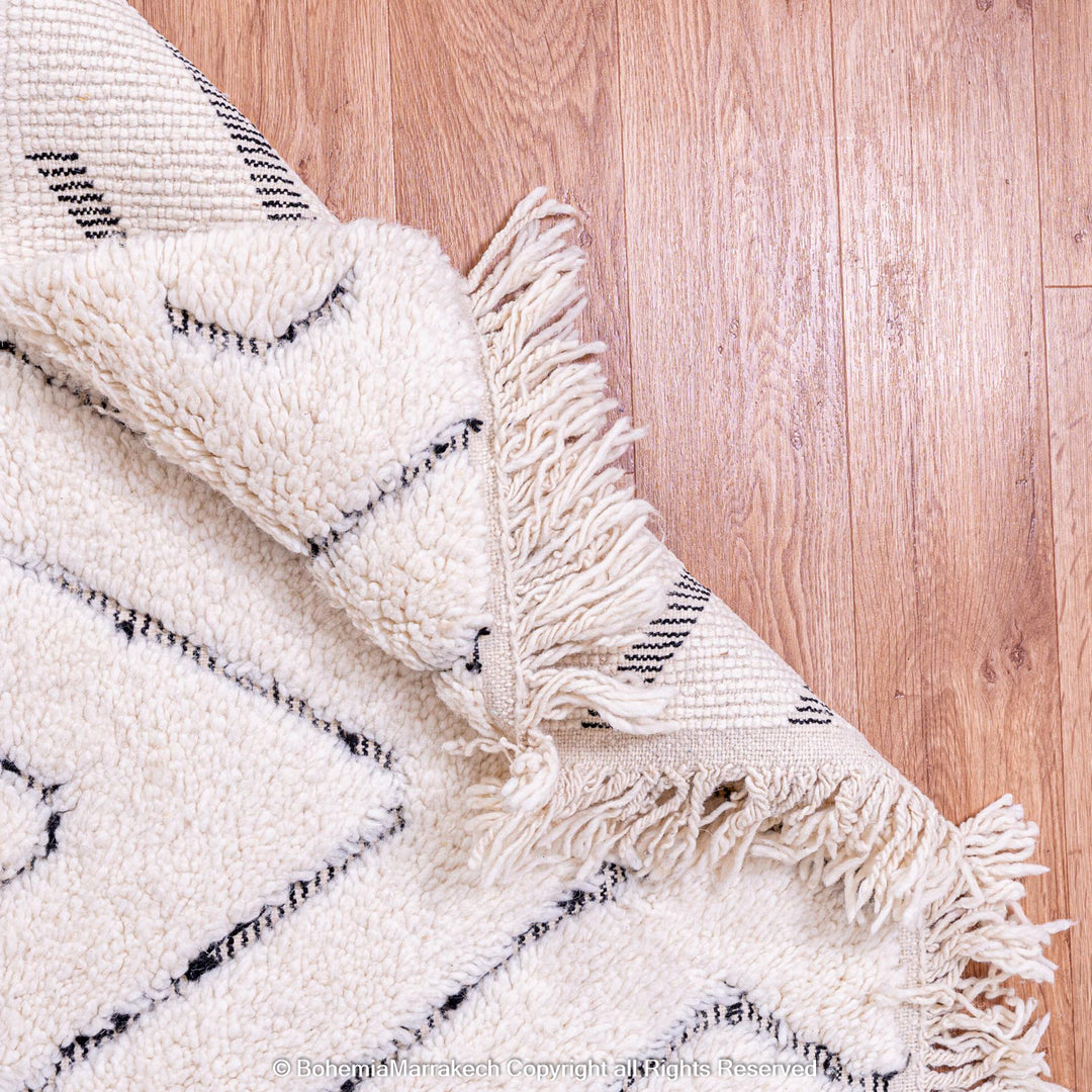 White Moroccan wool shag rug with black diamond lines