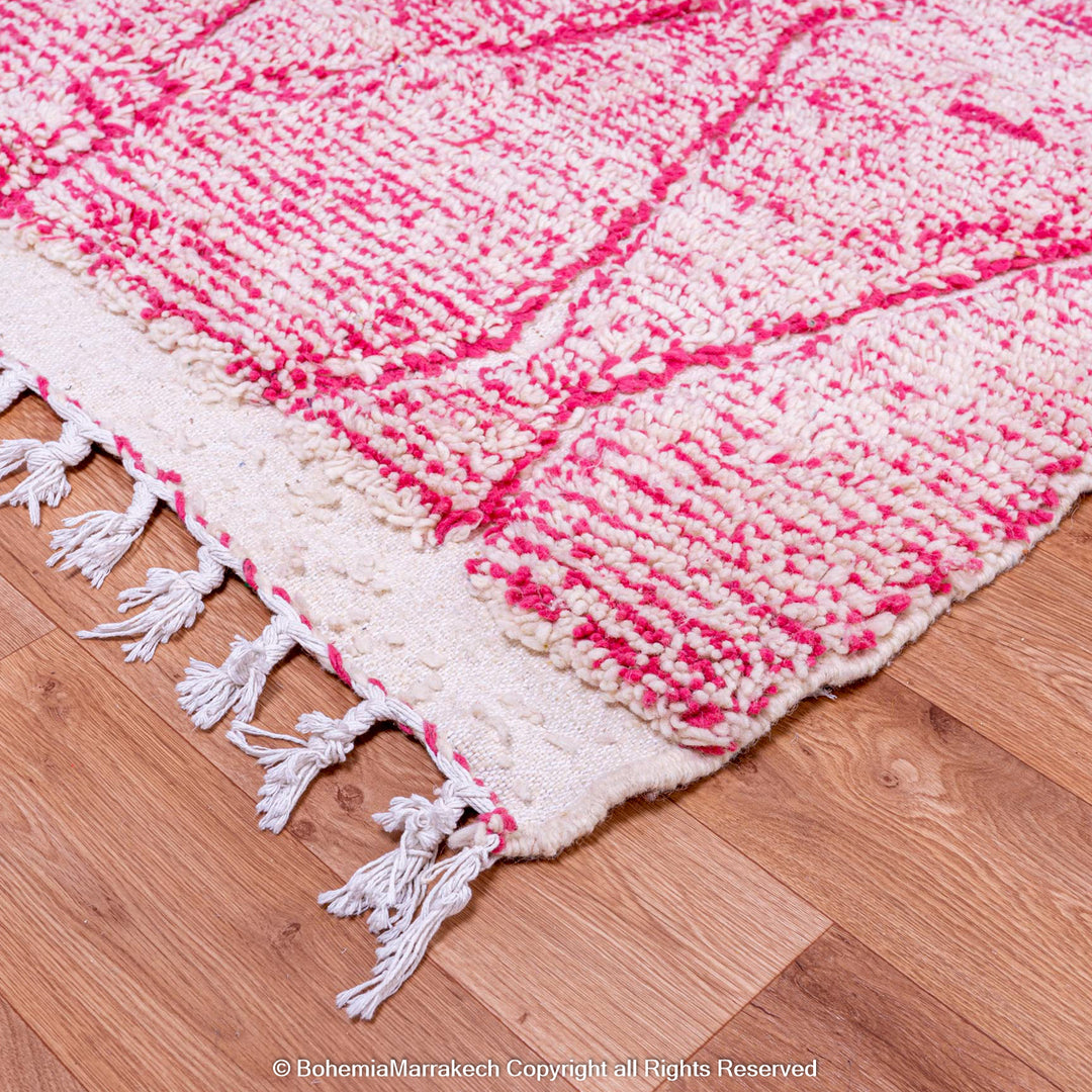 Handwoven pink Moroccan wool rug with Beni Ourain diamond pattern