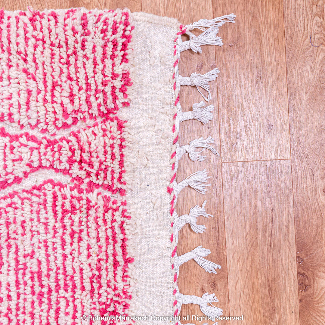 Handwoven pink Moroccan wool rug with Beni Ourain diamond pattern