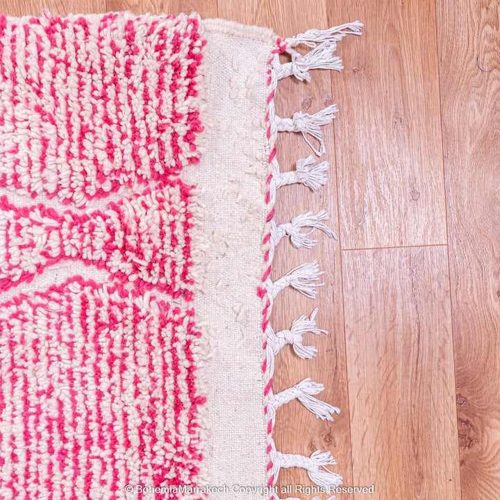 Handwoven pink Moroccan wool rug with Beni Ourain diamond pattern