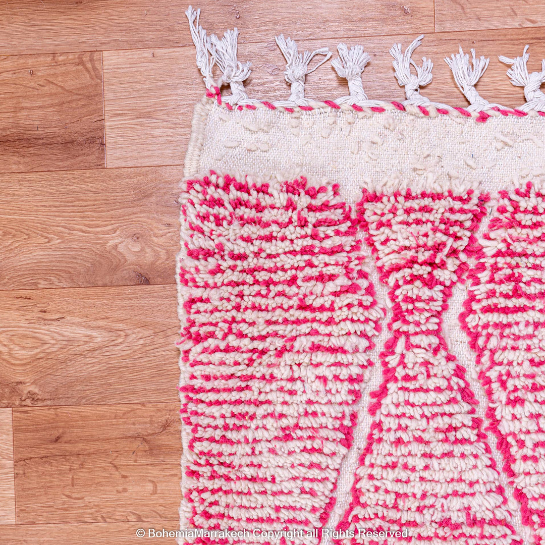Handwoven pink Moroccan wool rug with Beni Ourain diamond pattern