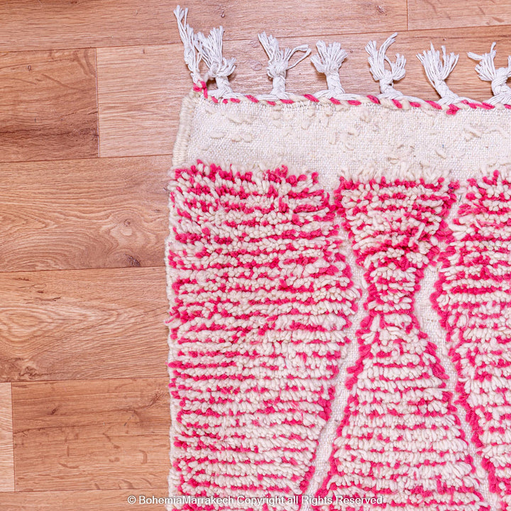 Handwoven pink Moroccan wool rug with Beni Ourain diamond pattern