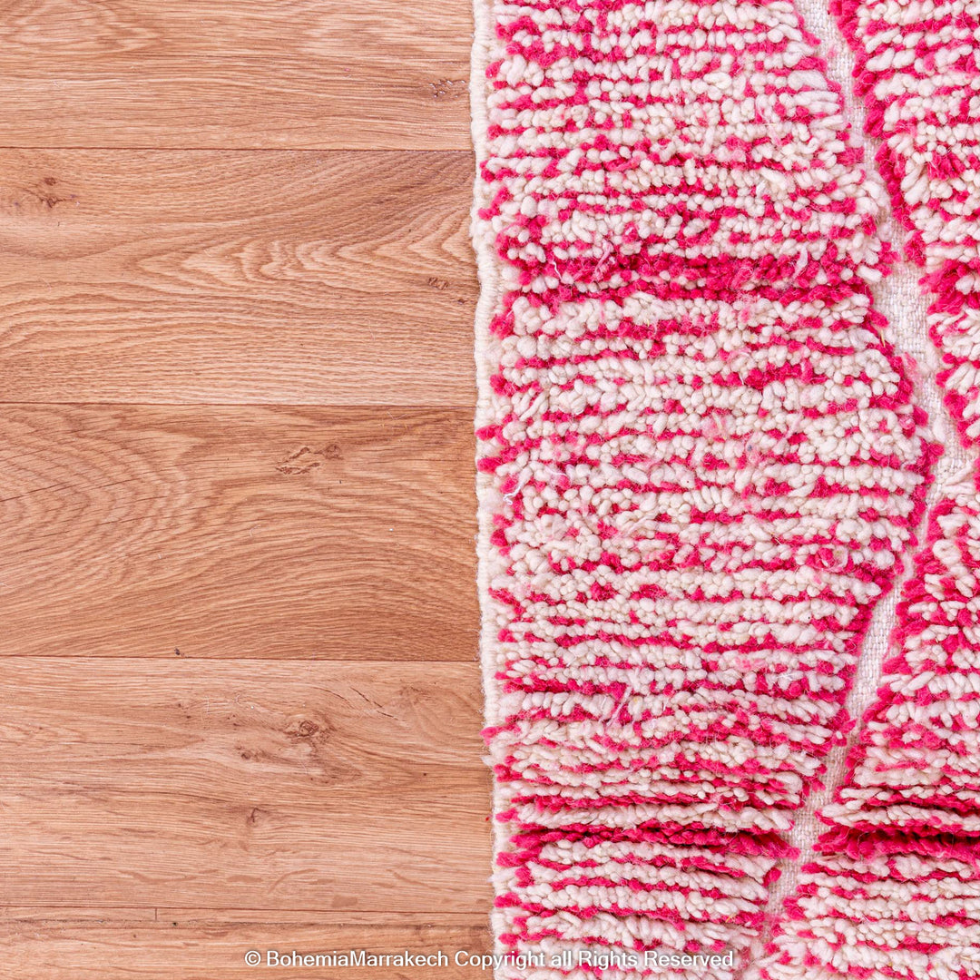 Handwoven pink Moroccan wool rug with Beni Ourain diamond pattern