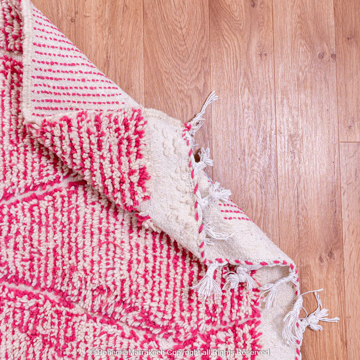 Handwoven pink Moroccan wool rug with Beni Ourain diamond pattern