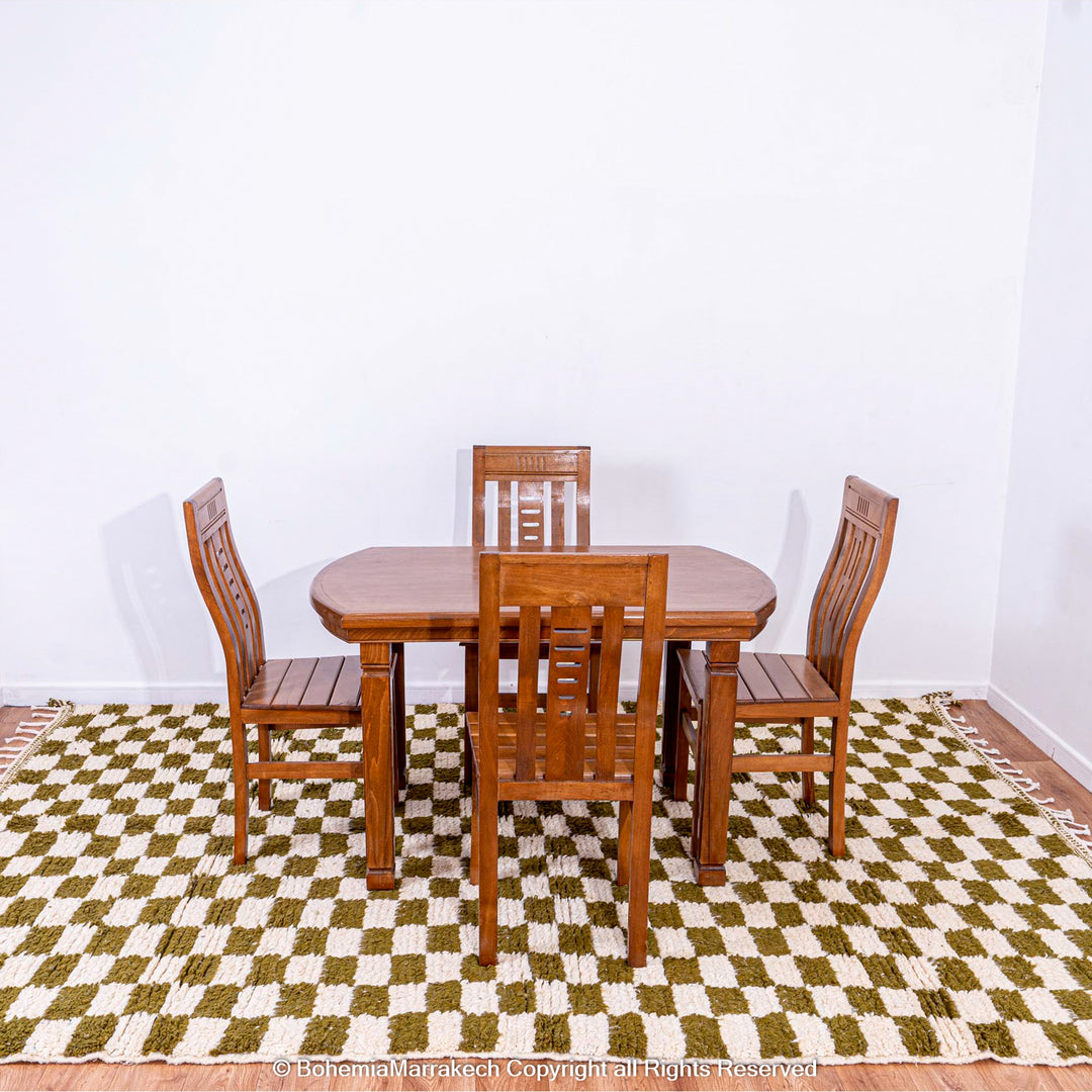 Shop a green white checkered Moroccan wool rug. Handwoven, bold, and stylish. Perfect for modern, boho, or traditional interiors.