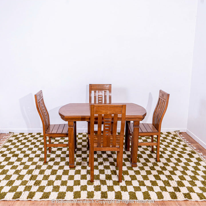 Shop a green white checkered Moroccan wool rug. Handwoven, bold, and stylish. Perfect for modern, boho, or traditional interiors.