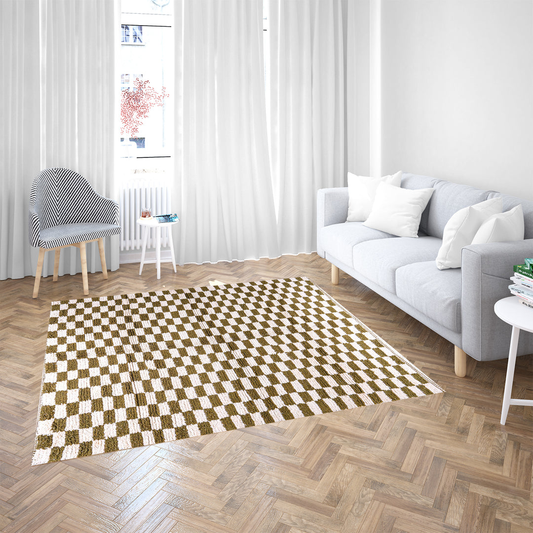 Shop a green white checkered Moroccan wool rug. Handwoven, bold, and stylish. Perfect for modern, boho, or traditional interiors.