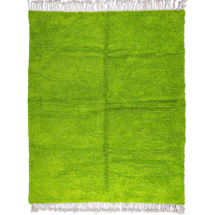 Solid green handmade Moroccan wool rug with white fringe, custom Beni Ourain carpet