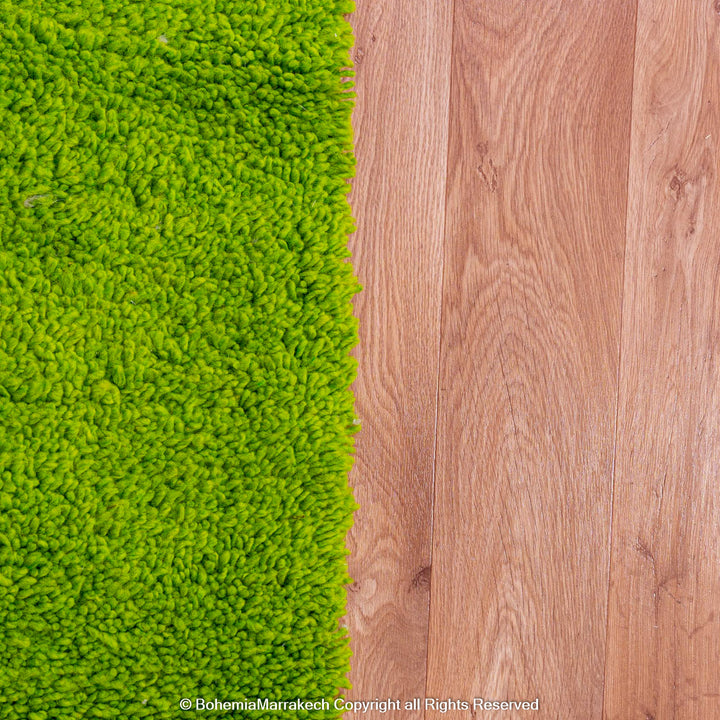 Solid green handmade Moroccan wool rug with white fringe, custom Beni Ourain carpet