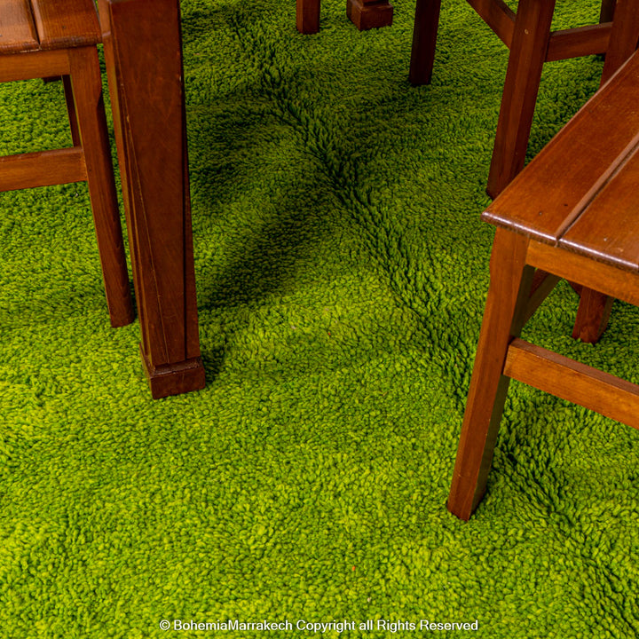 Solid green handmade Moroccan wool rug with white fringe, custom Beni Ourain carpet