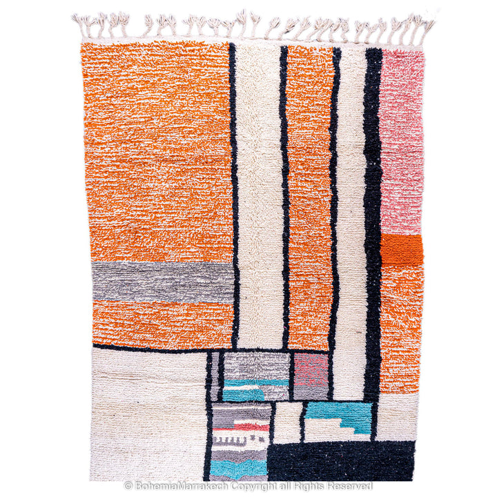 Colorful Moroccan rug with orange base and geometric wool patterns in black, cream, turquoise, and pink