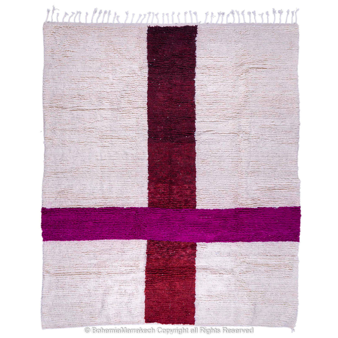 Handmade Moroccan wool rug with burgundy and magenta cross on ivory background – Beni Ourain style