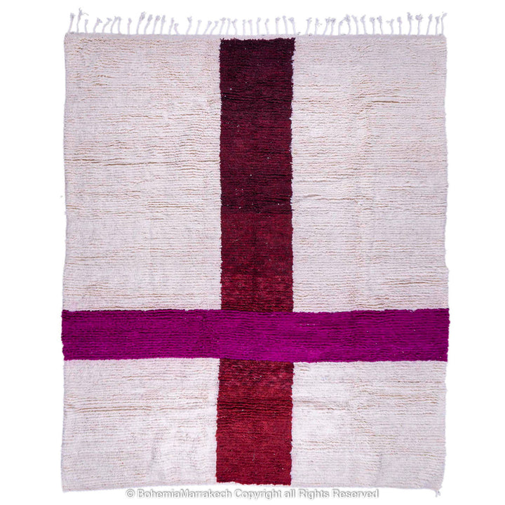 Handmade Moroccan wool rug with burgundy and magenta cross on ivory background – Beni Ourain style