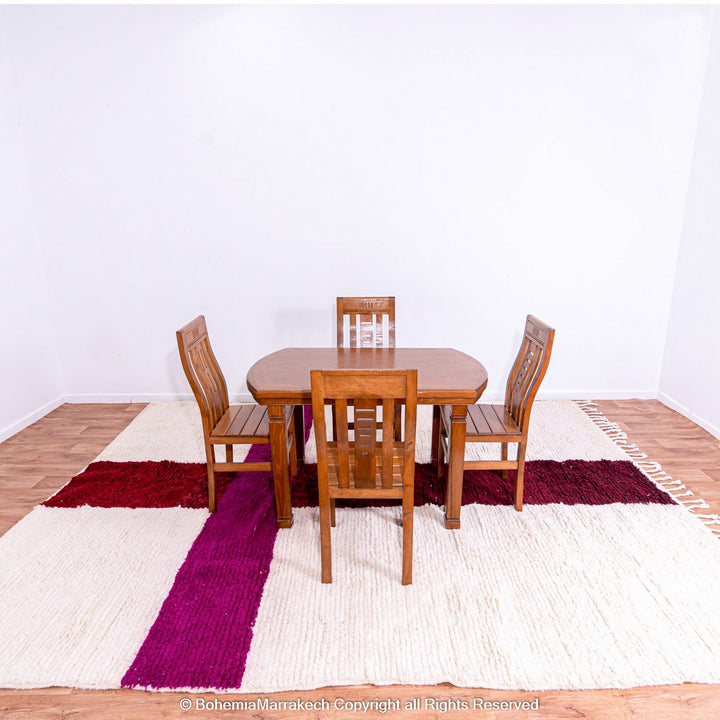Handmade Moroccan wool rug with burgundy and magenta cross on ivory background – Beni Ourain style