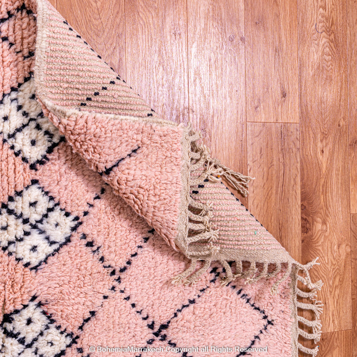 Pink Boujaad Moroccan rug with handwoven diamond tribal motifs in natural wool