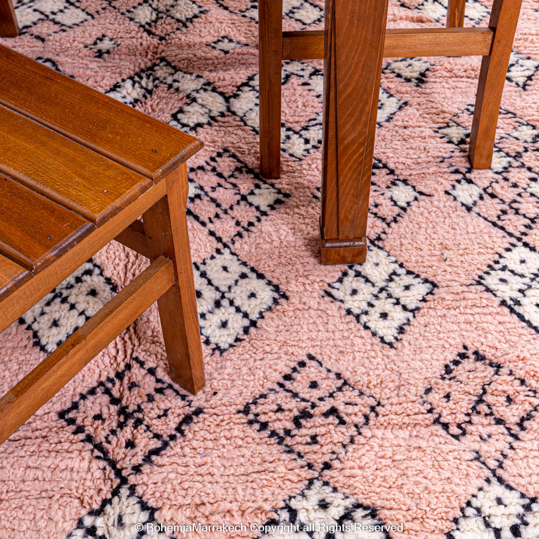 Pink Boujaad Moroccan rug with handwoven diamond tribal motifs in natural wool