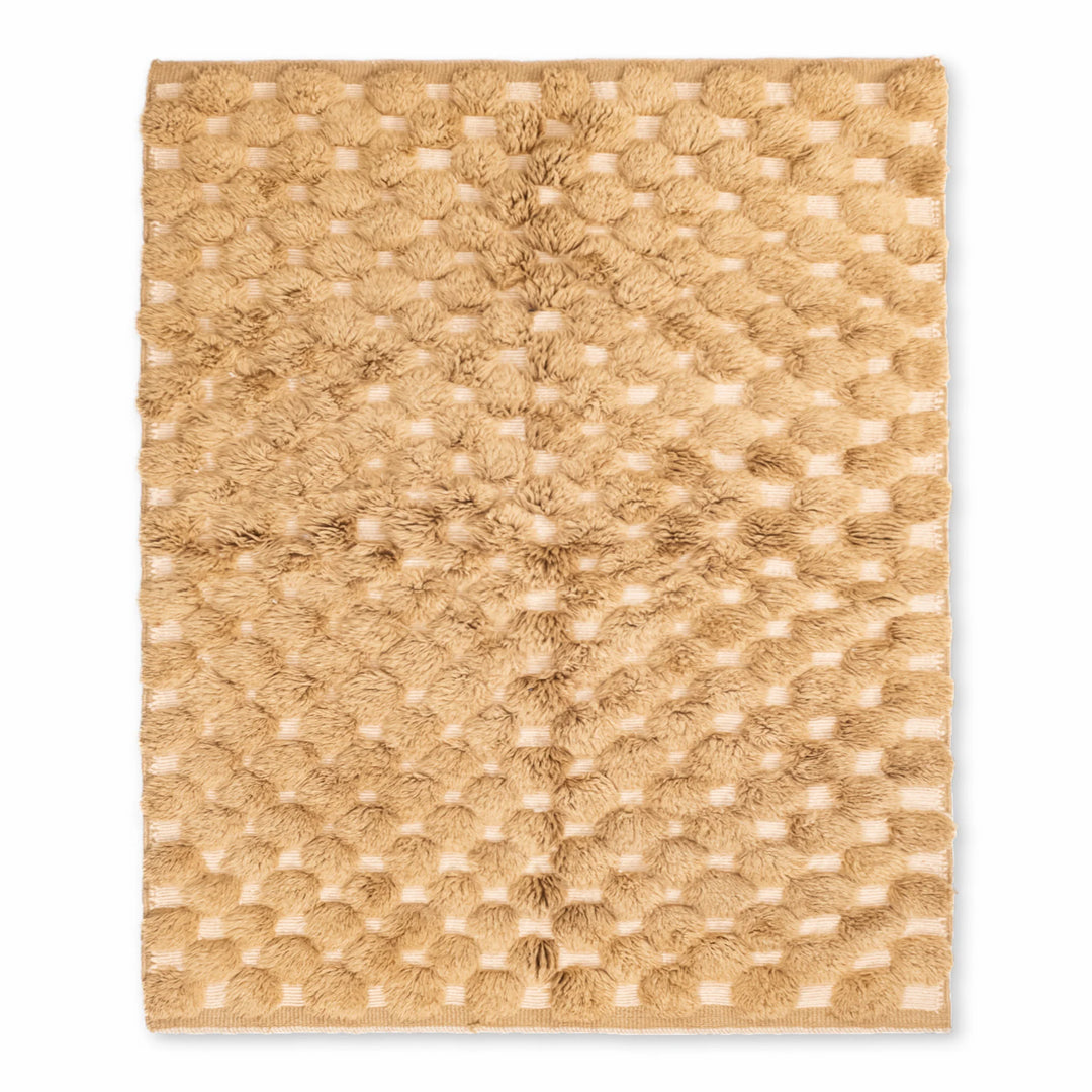 Handmade Moroccan rug with a textured Berber pattern, beige color, perfect for modern and boho interiors.