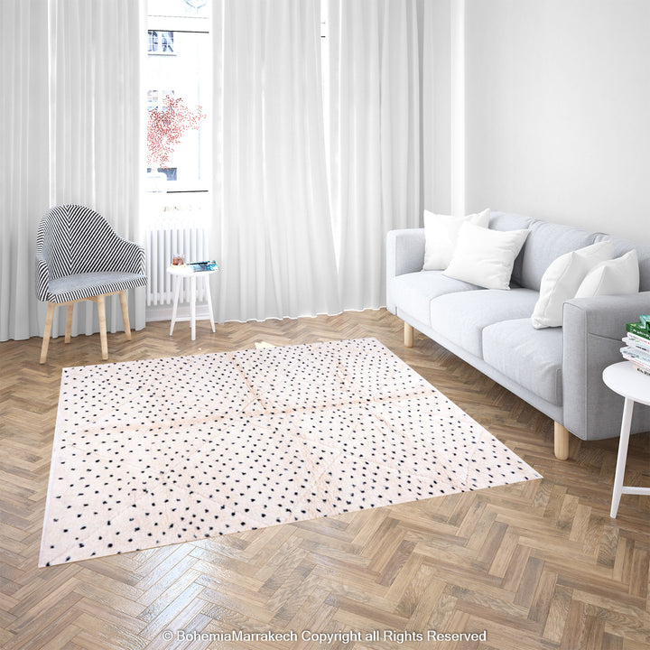 White Moroccan Beni Ourain rug with black dots in modern living room, showcasing traditional Berber craftsmanship and wool texture.