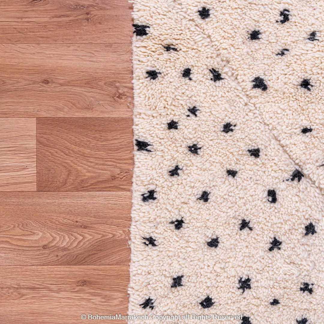 White Moroccan Beni Ourain rug with black dots, handcrafted Berber wool rug, perfect for modern or traditional interiors.