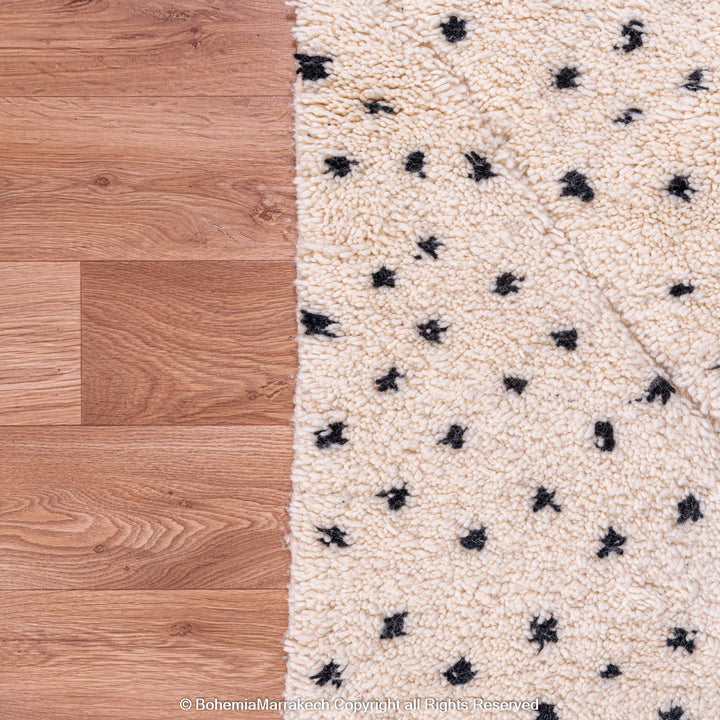 White Moroccan Beni Ourain rug with black dots, handcrafted Berber wool rug, perfect for modern or traditional interiors.