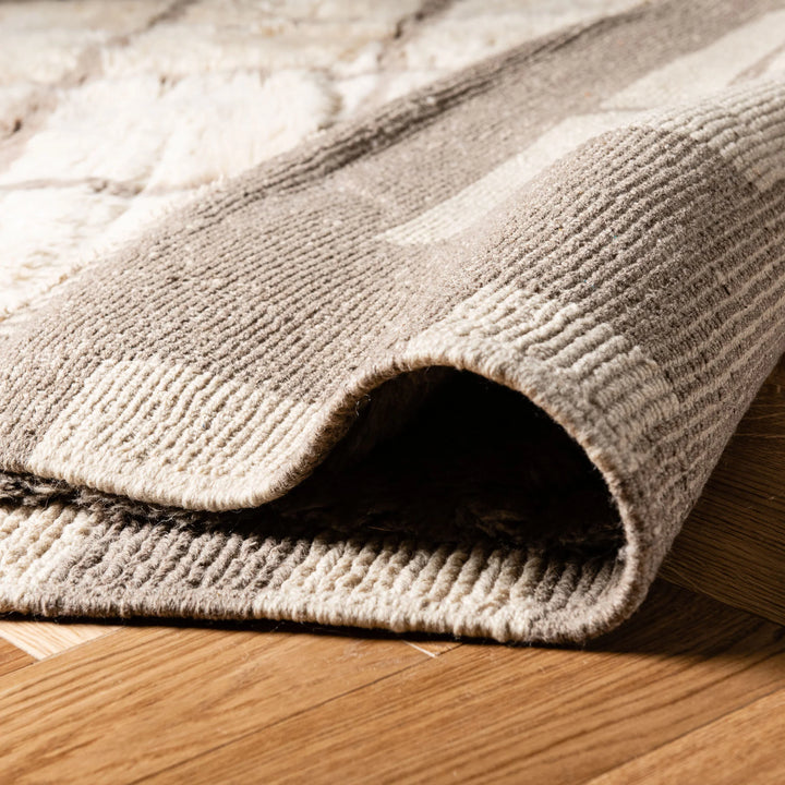 Custom Moroccan wool rug with a grid pattern, showcasing soft texture and craftsmanship, perfect for living room or bedroom decor.