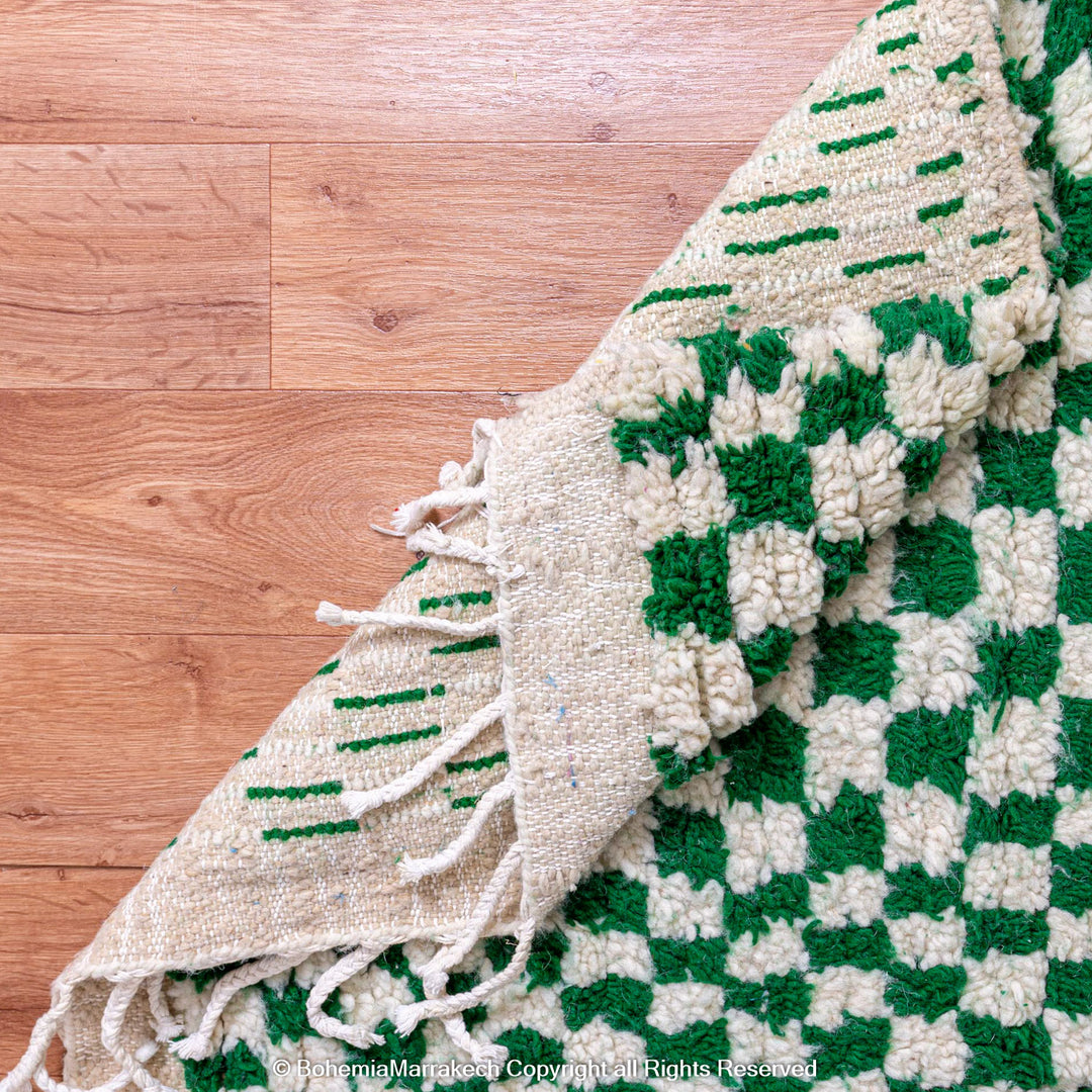 Handmade green and white checkered Moroccan wool rug with geometric checkerboard pattern