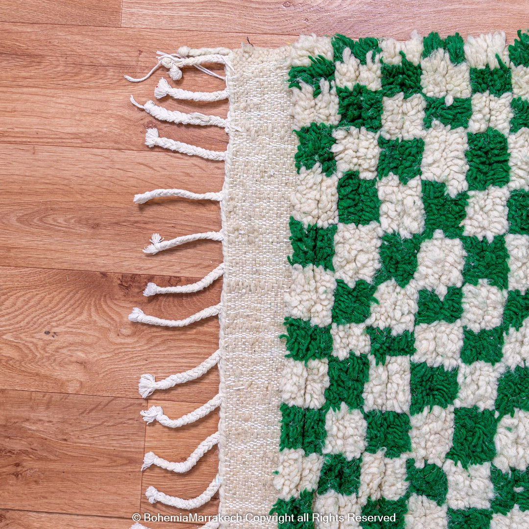 Handmade green and white checkered Moroccan wool rug with geometric checkerboard pattern