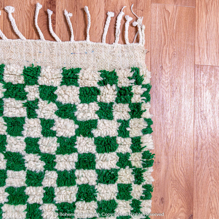Handmade green and white checkered Moroccan wool rug with geometric checkerboard pattern