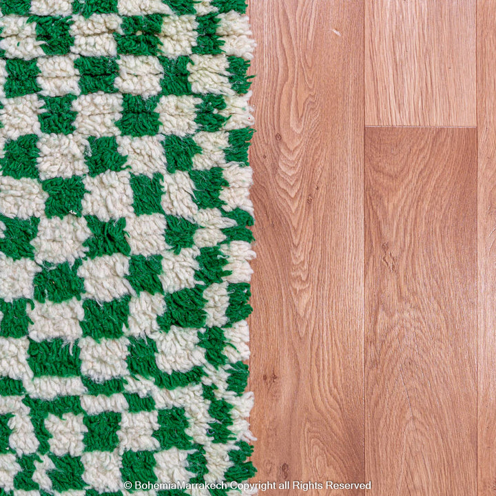 Handmade green and white checkered Moroccan wool rug with geometric checkerboard pattern