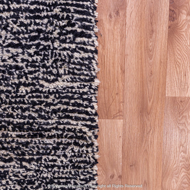 Abstract Grey Moroccan Wool Rug on Wooden Floor