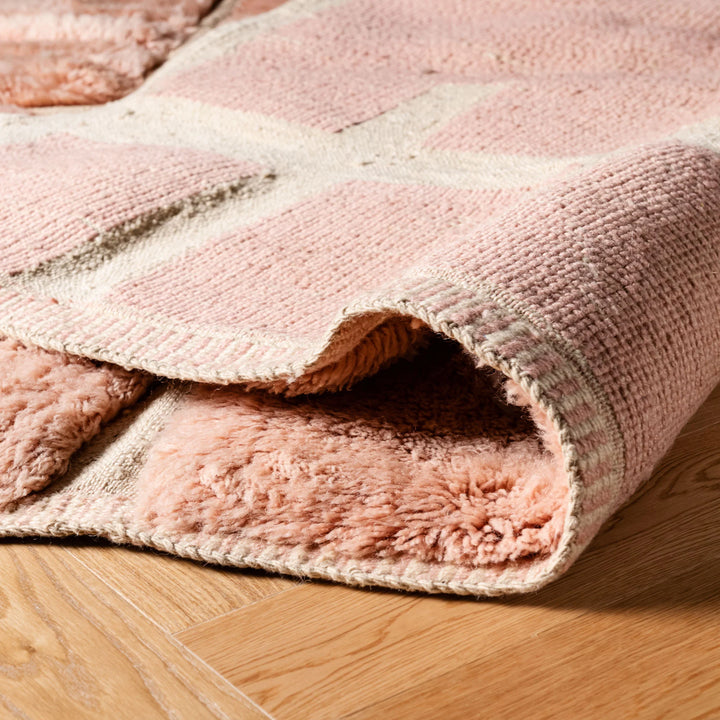 Custom Soft Pink Moroccan Rug with Modern Brick Pattern on Wooden Floor