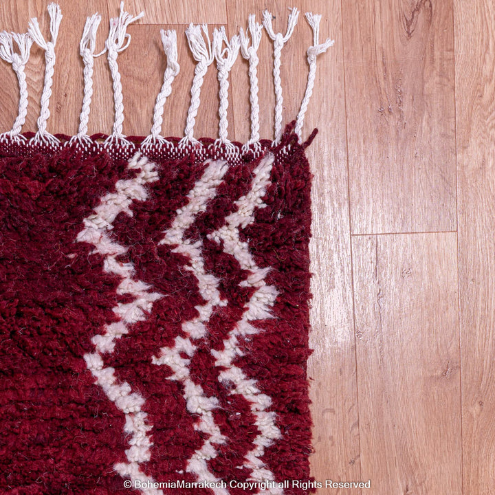 Handmade Burgundy Boujaad Moroccan Rug with Tribal White Lines