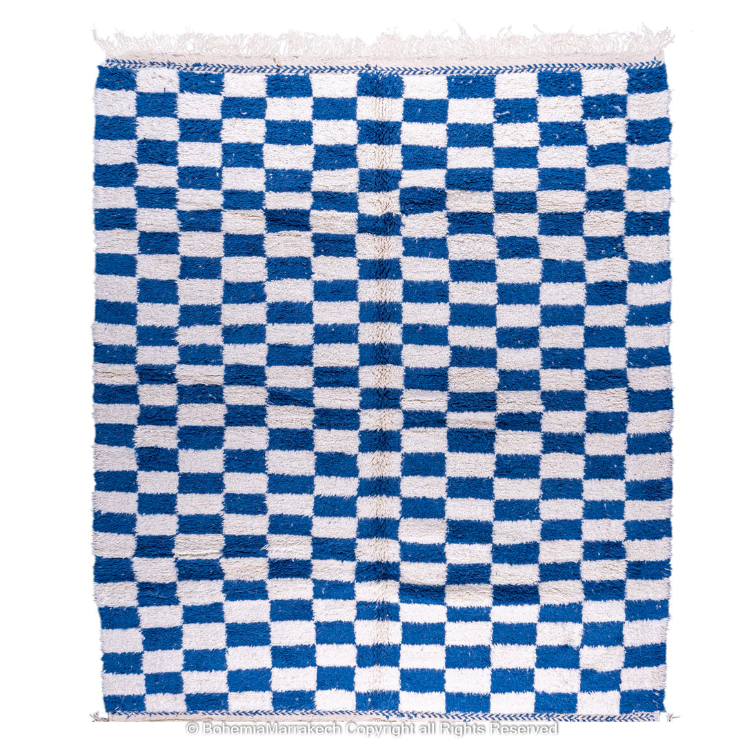Blue and white checkered Moroccan wool rug with plush shag texture