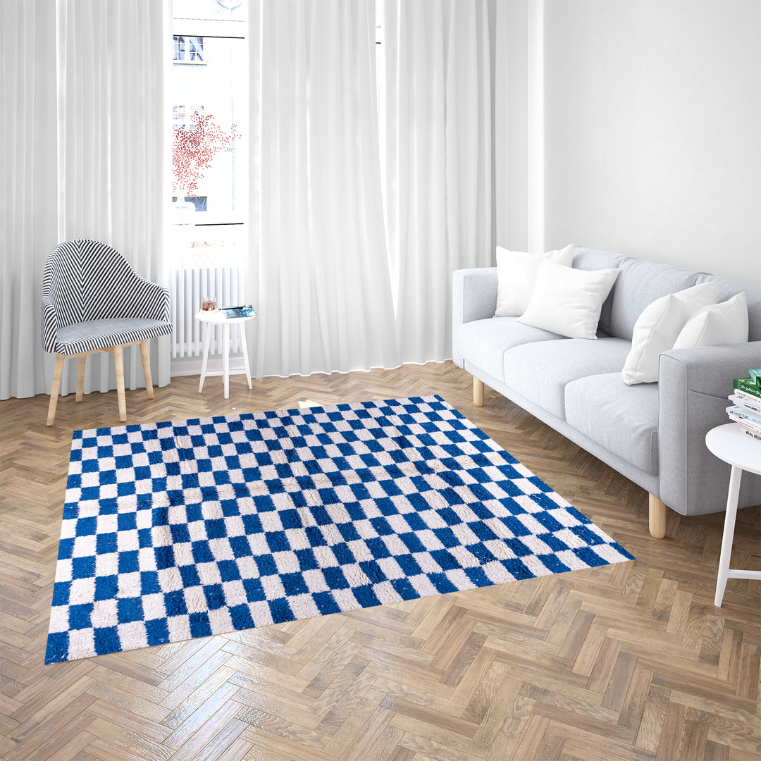 Blue and white checkered Moroccan wool rug with plush shag texture