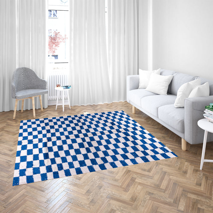 Blue and white checkered Moroccan wool rug with plush shag texture