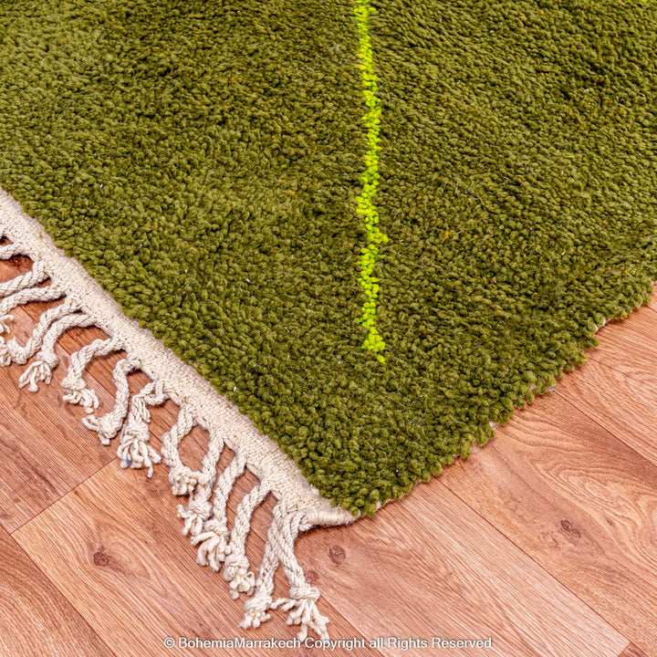 Handmade green Moroccan wool rug with neon yellow diamond line pattern