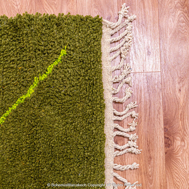 Handmade green Moroccan wool rug with neon yellow diamond line pattern
