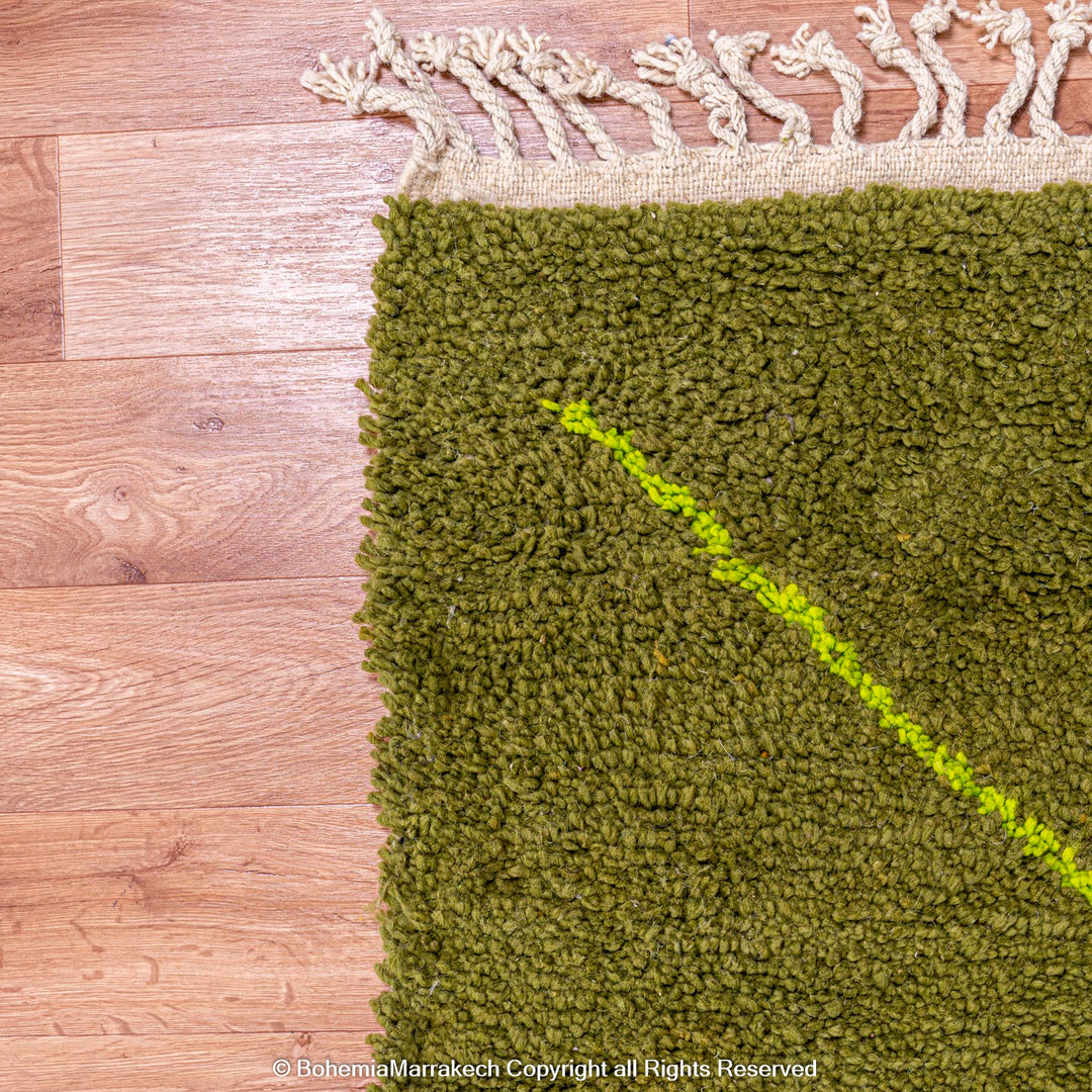 Handmade green Moroccan wool rug with neon yellow diamond line pattern