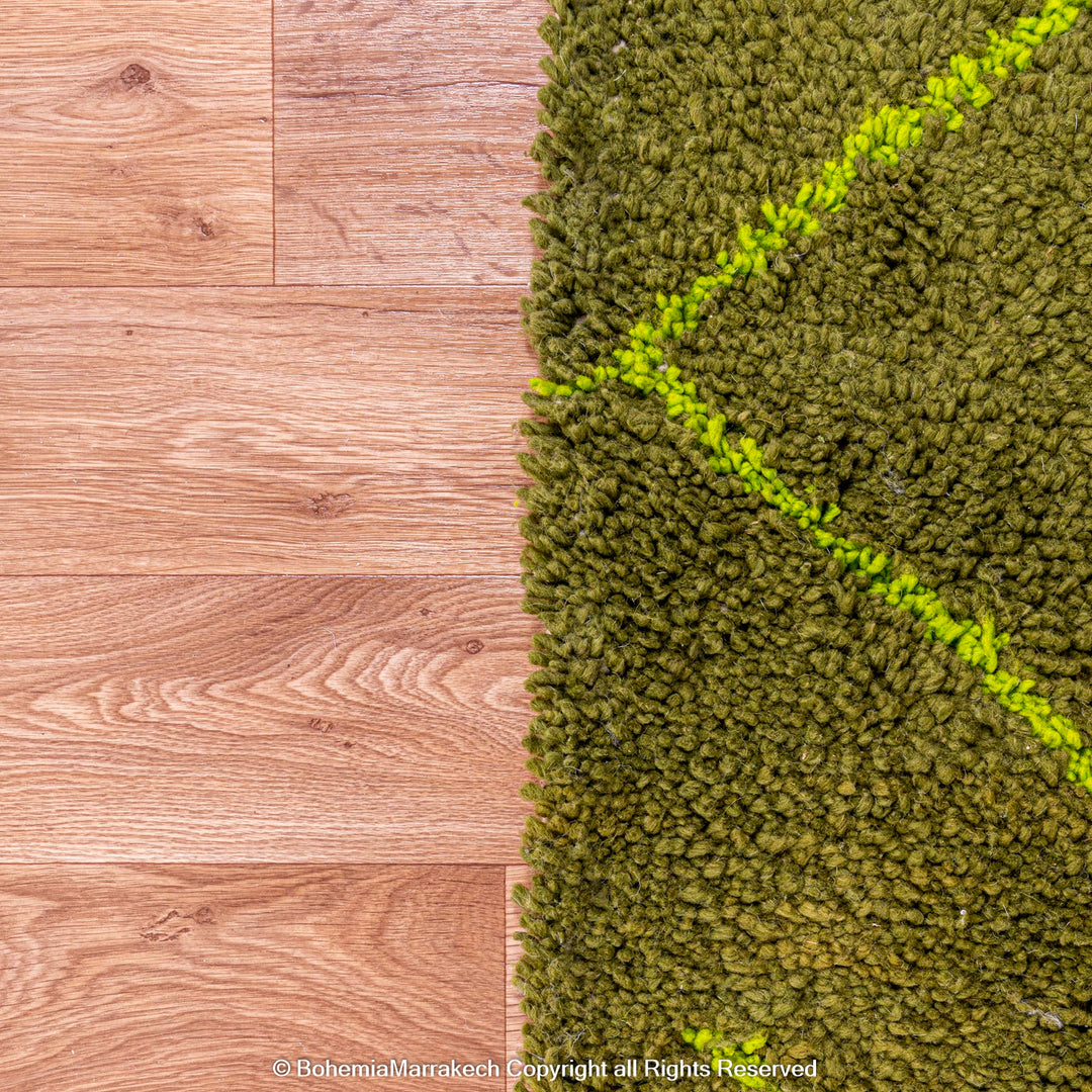 Handmade green Moroccan wool rug with neon yellow diamond line pattern