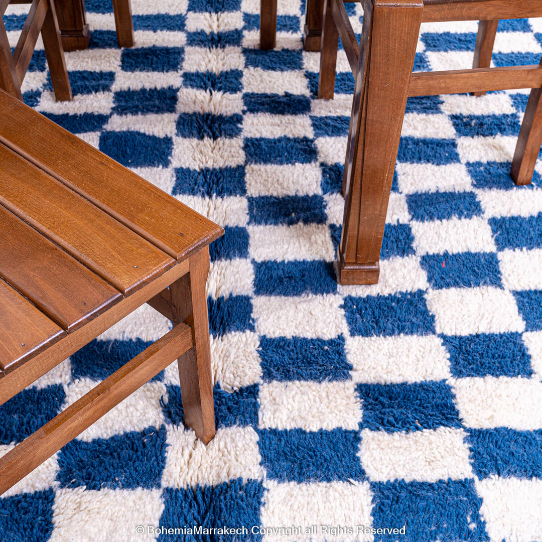 Blue and white checkered Moroccan wool rug with plush shag texture