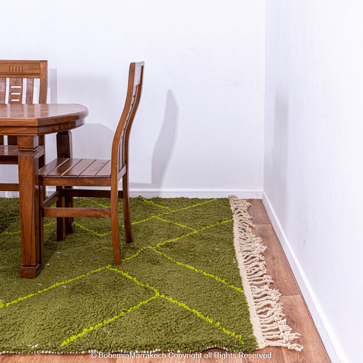 Handmade green Moroccan wool rug with neon yellow diamond line pattern