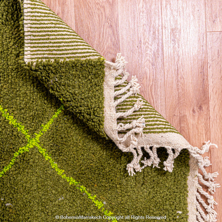 Handmade green Moroccan wool rug with neon yellow diamond line pattern