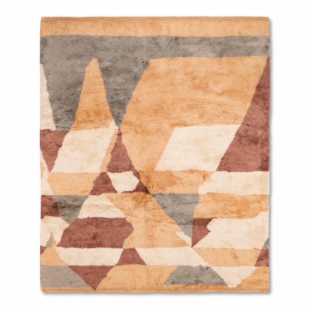 Handmade Moroccan wool rug with geometric earth tone design—ideal for living rooms. Traditional Berber craftsmanship. Available for sale.